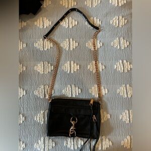 Rebecca Minkoff bag. Black leather with rose gold hardware. Dust bag included